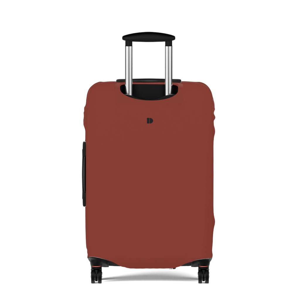 A rust-brown luggage cover fitted over a hard-shell rolling suitcase, shown from the front on a clean white background. The cover has a small black monogram logo near the top center and a side vent on the left.