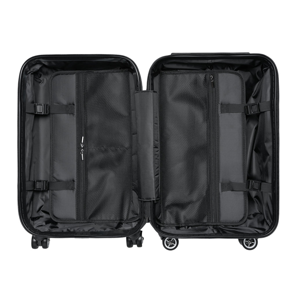 Black interior of suitcase showing pouches and straps for packing on a white background.