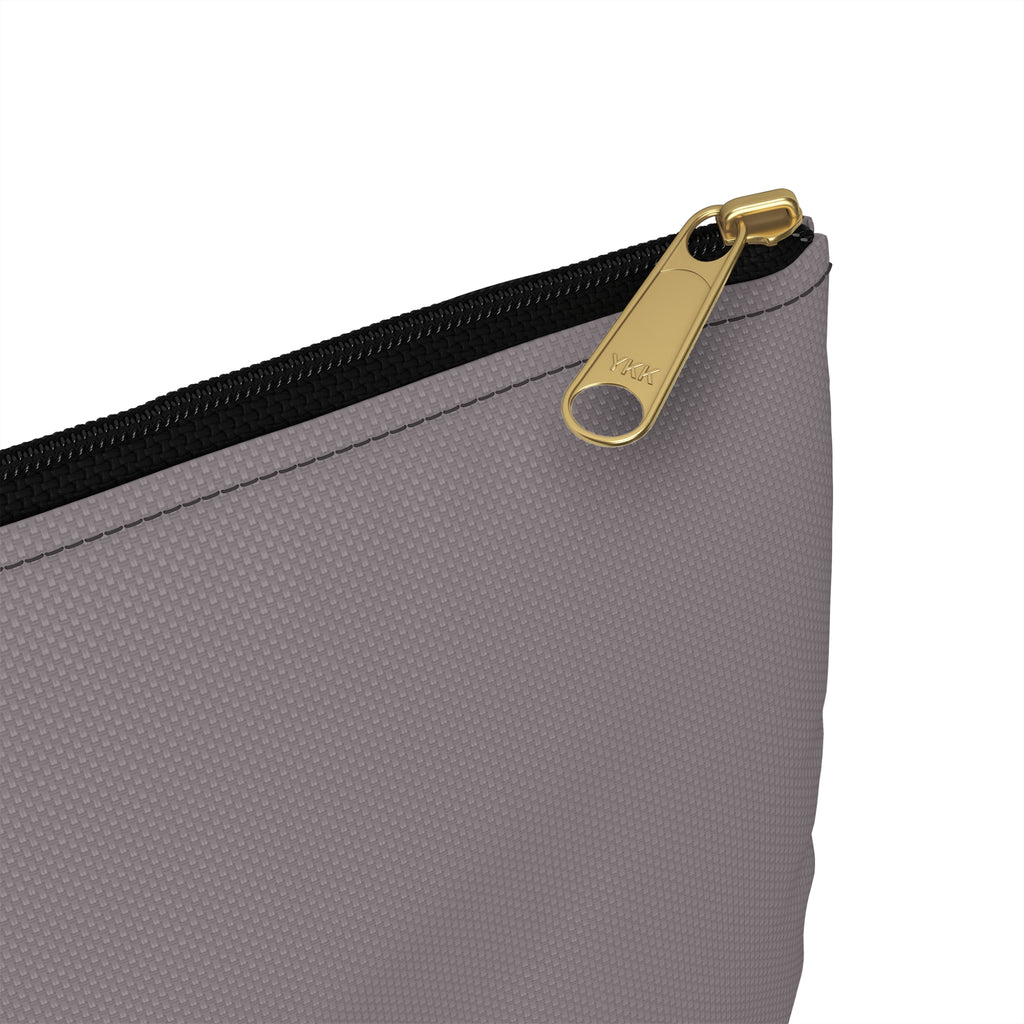 Close-up of a gray textured pouch with a black zipper and a gold-tone metal pull tab on a white background.