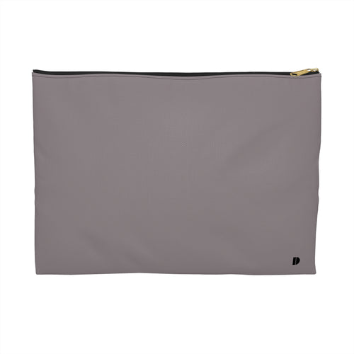 A minimalist rectangular zippered pouch in a muted gray, featuring a black zipper and a small black logo on the bottom right corner, set against a plain white background.