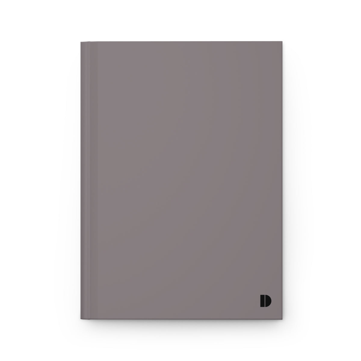 A minimalist hardcover notebook in a muted taupe-gray color, featuring a small black stylized 'D' logo in the bottom right corner, set against a clean white background.