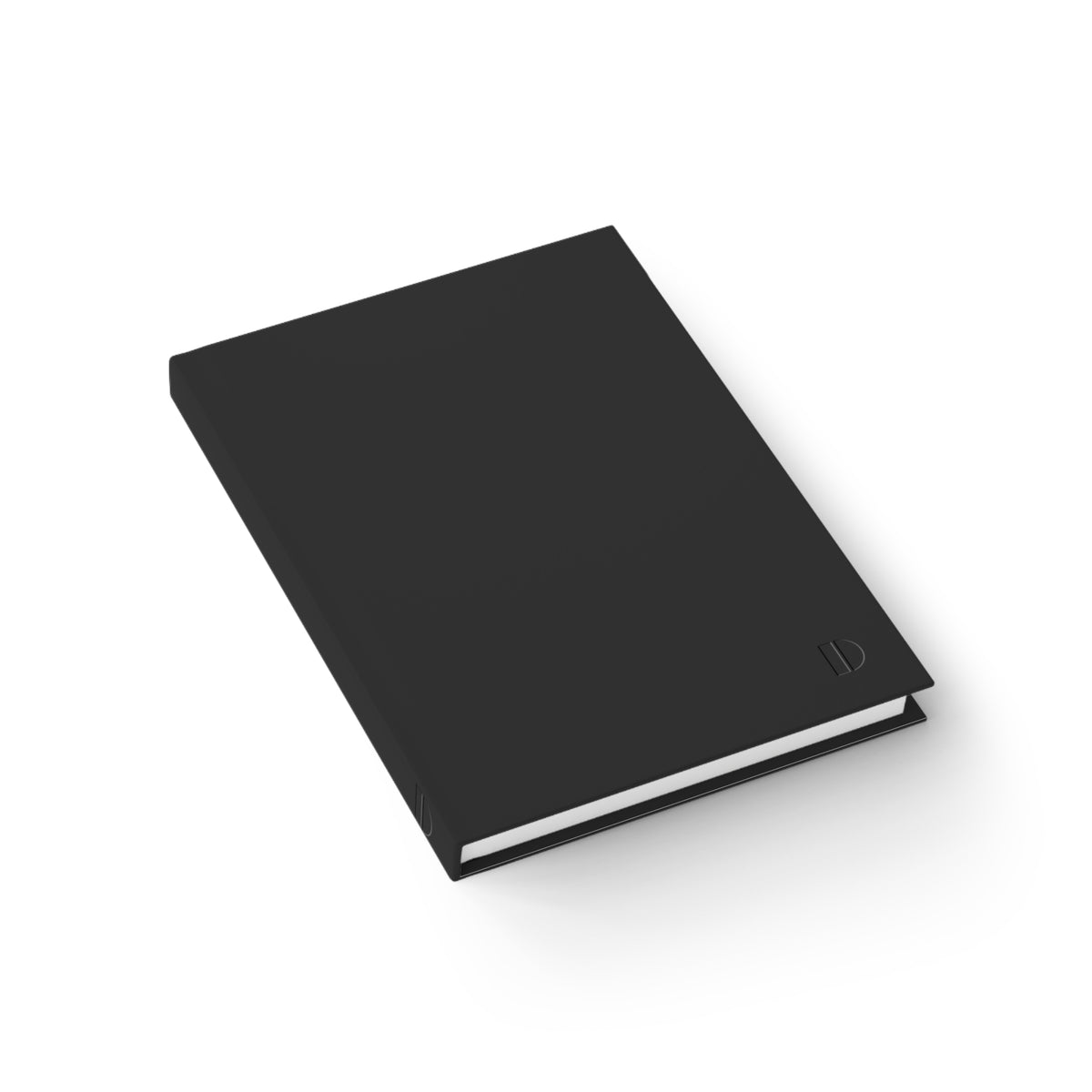 An angled overhead view of the charcoal hardcover journal by The Cultivated Desk, showcasing the sturdy spine construction and high-quality paper book block.