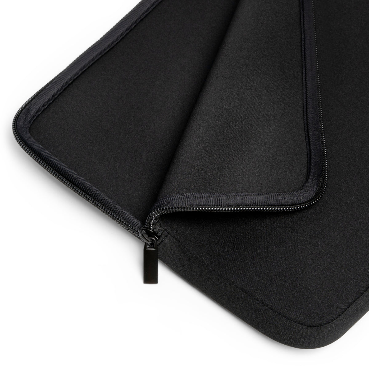 Black protective interior of laptop sleeve shown on a white background