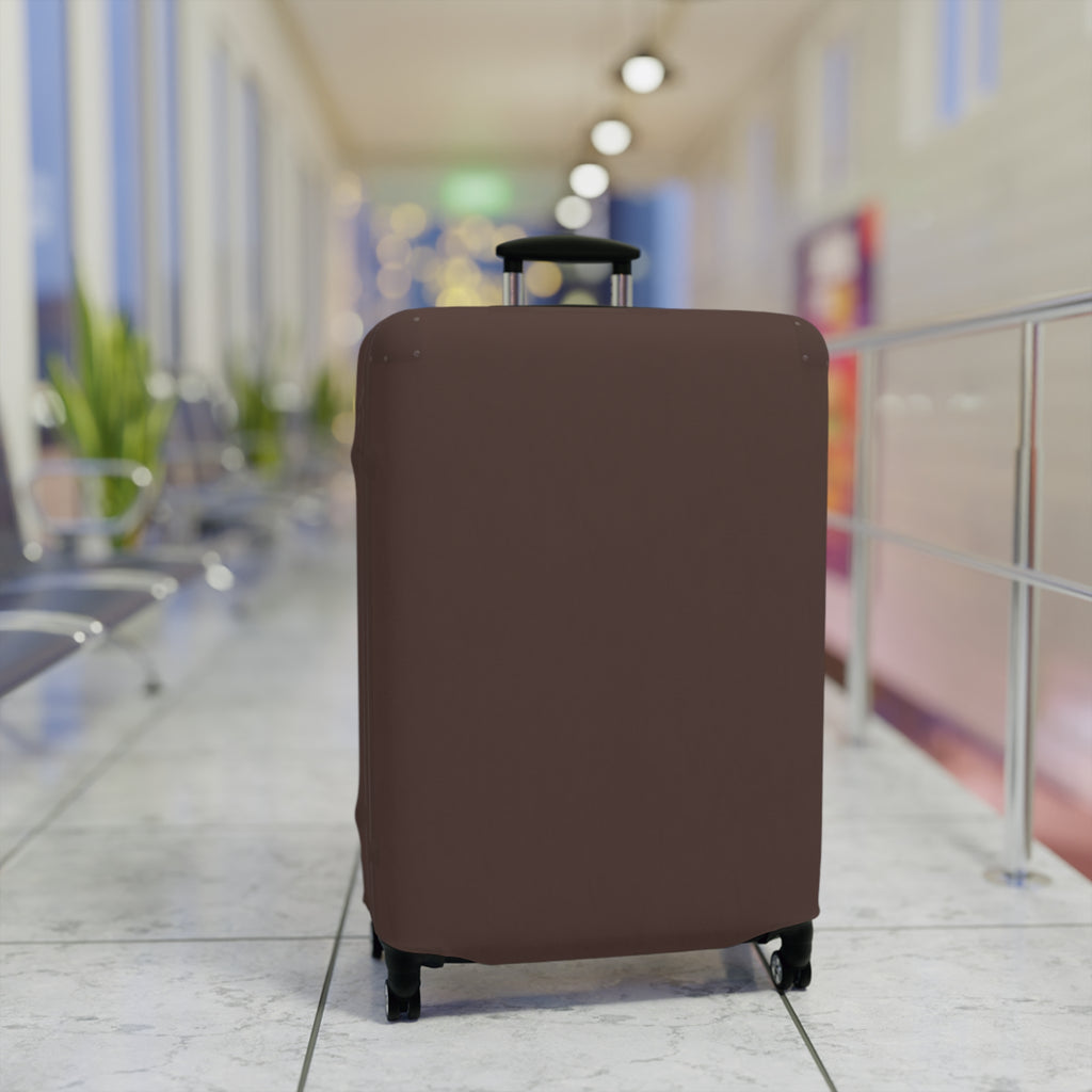 A brown protective luggage cover fitted on a rolling suitcase, set in a blurred airport terminal hallway.