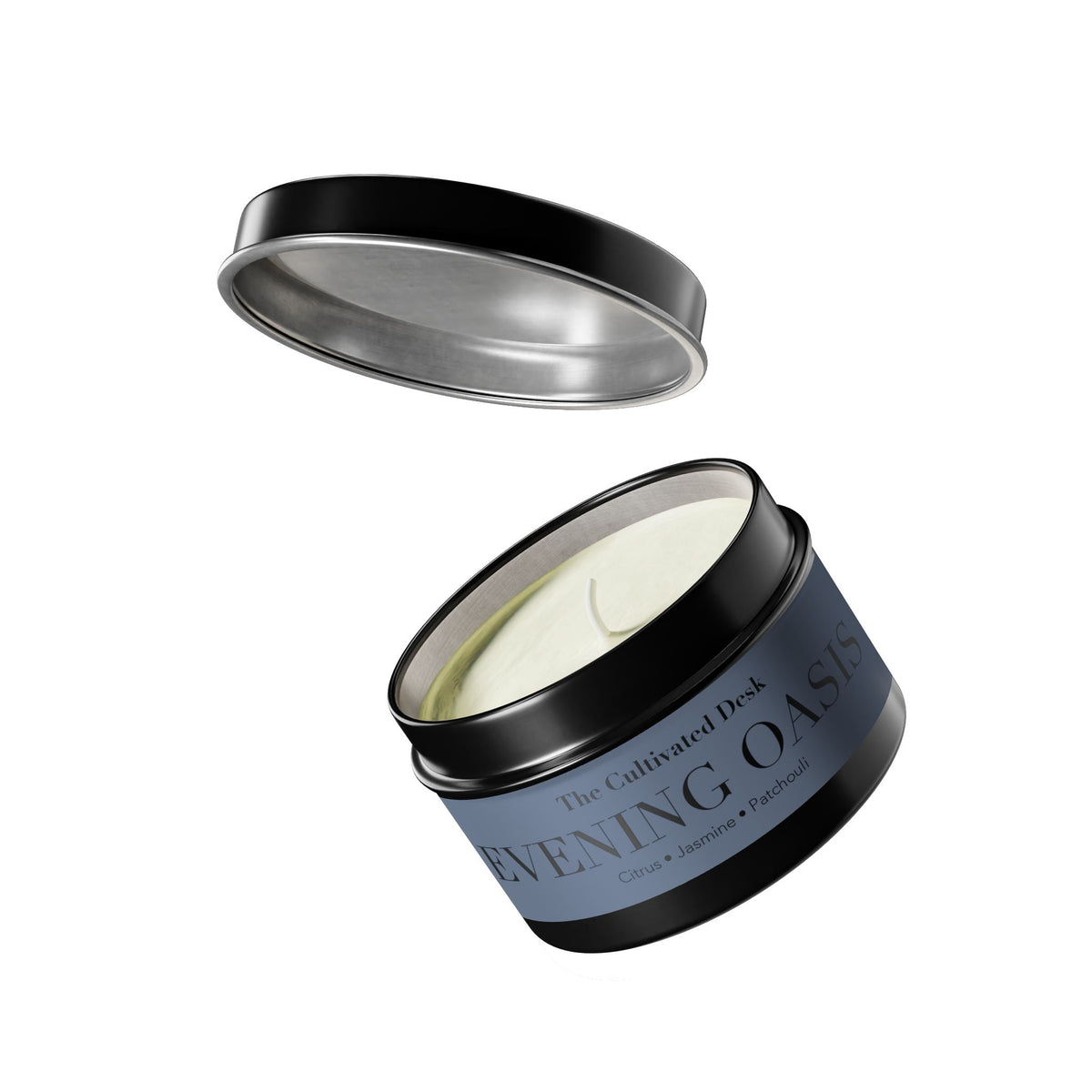 An open round metal tin candle with a black lid floating above it on a white background. The candle inside is off-white, and the tin has a dark blue label reading 'The Cultivated Desk' and 'EVENING OASIS'.