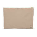 A minimalist beige zippered pouch with a small black logo in the bottom right corner and a gold zipper pull, shown on a solid white background.