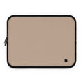 A beige laptop sleeve with a black zipper and black trim, featuring a small black logo in the bottom right corner, shown on a plain white background.