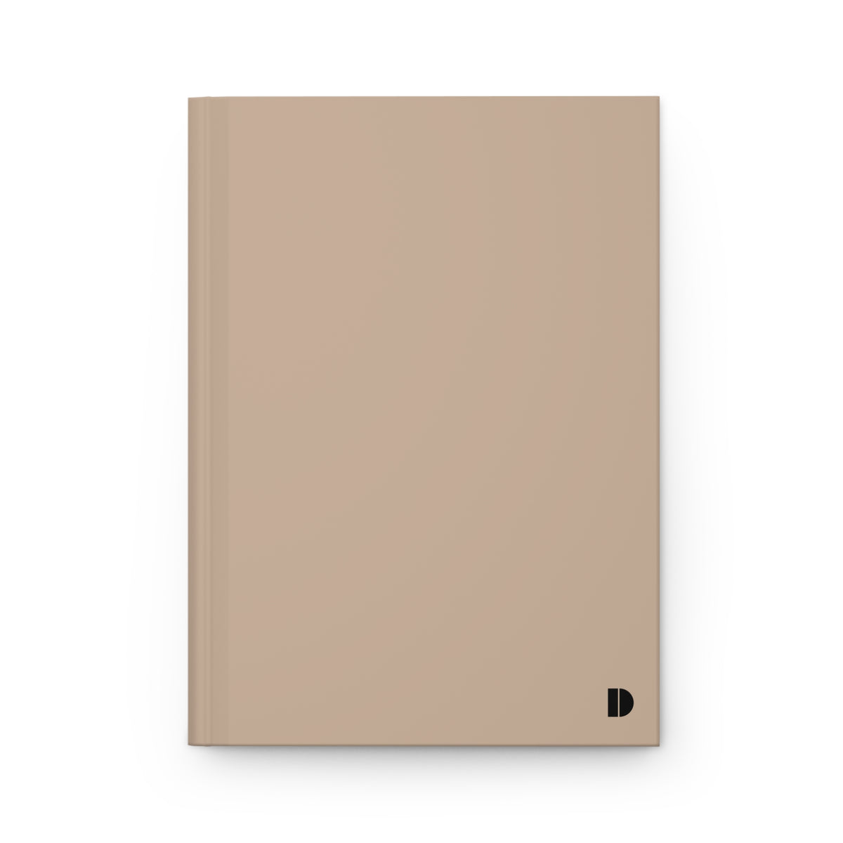 A minimalist hardcover notebook in a muted beige color, featuring a small black stylized 'D' logo in the bottom right corner, set against a clean white background.