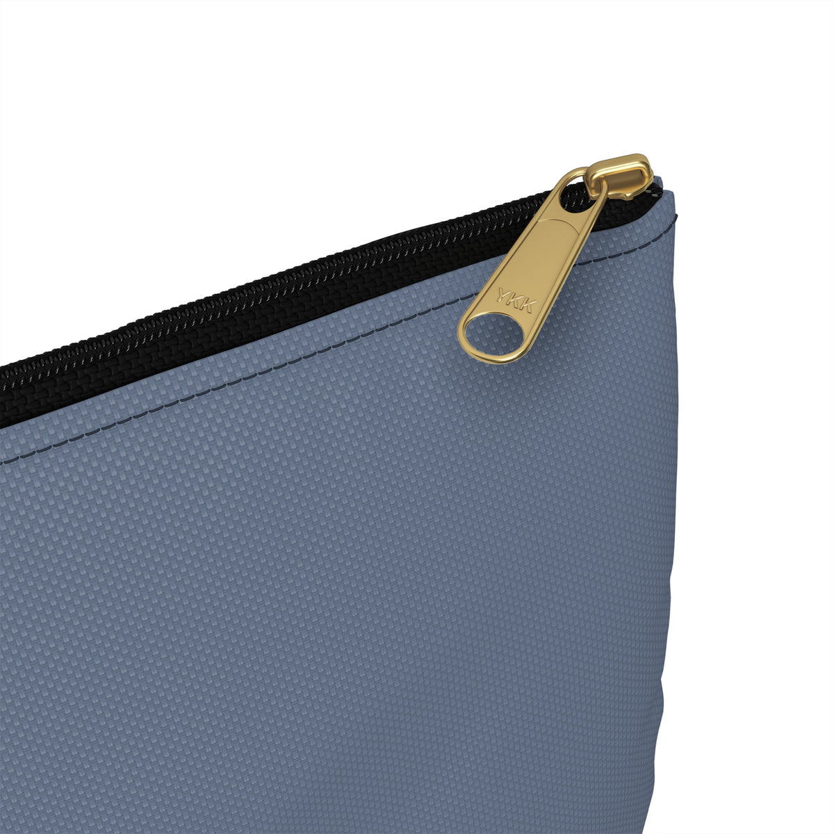 Close-up of a dusty blue textured pouch with a black zipper and a gold metal pull tab on a white background.