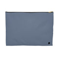 A rectangular dusty blue pouch with a black zipper and a small black logo in the bottom right corner, shown against a plain white background.
