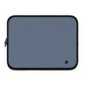 A slate blue laptop sleeve with black trim and a small black monogram logo in the bottom right corner, shown on a plain white background.