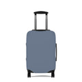 A light blue protective luggage cover fitted on a hard-shell suitcase with an extended telescoping handle and four wheels, shown against a plain white background.