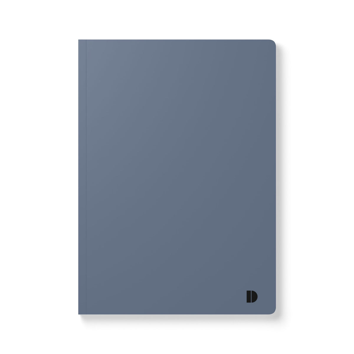 A minimalist softcover notebook in a muted slate blue color, featuring a small black stylized 'D' logo in the bottom right corner, set against a clean white background.