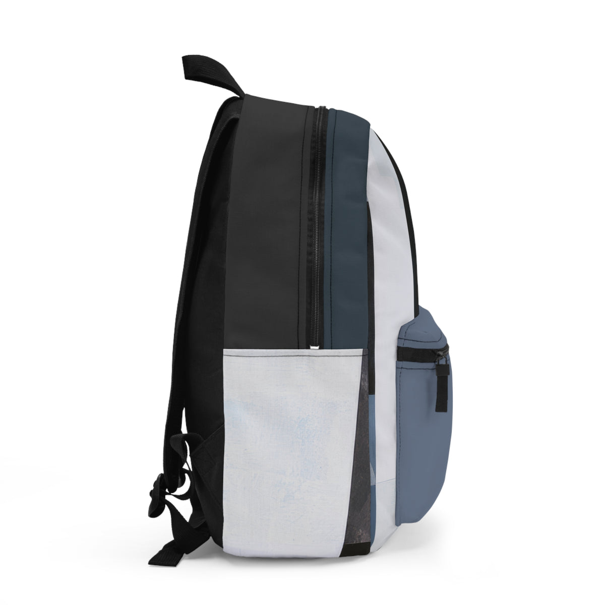 A color-blocked backpack shown from the side profile on a clean white background. The backpack features three main color sections: a black upper section, a dark slate blue middle section, and a light gray lower pocket, with a matching slate blue side pocket.