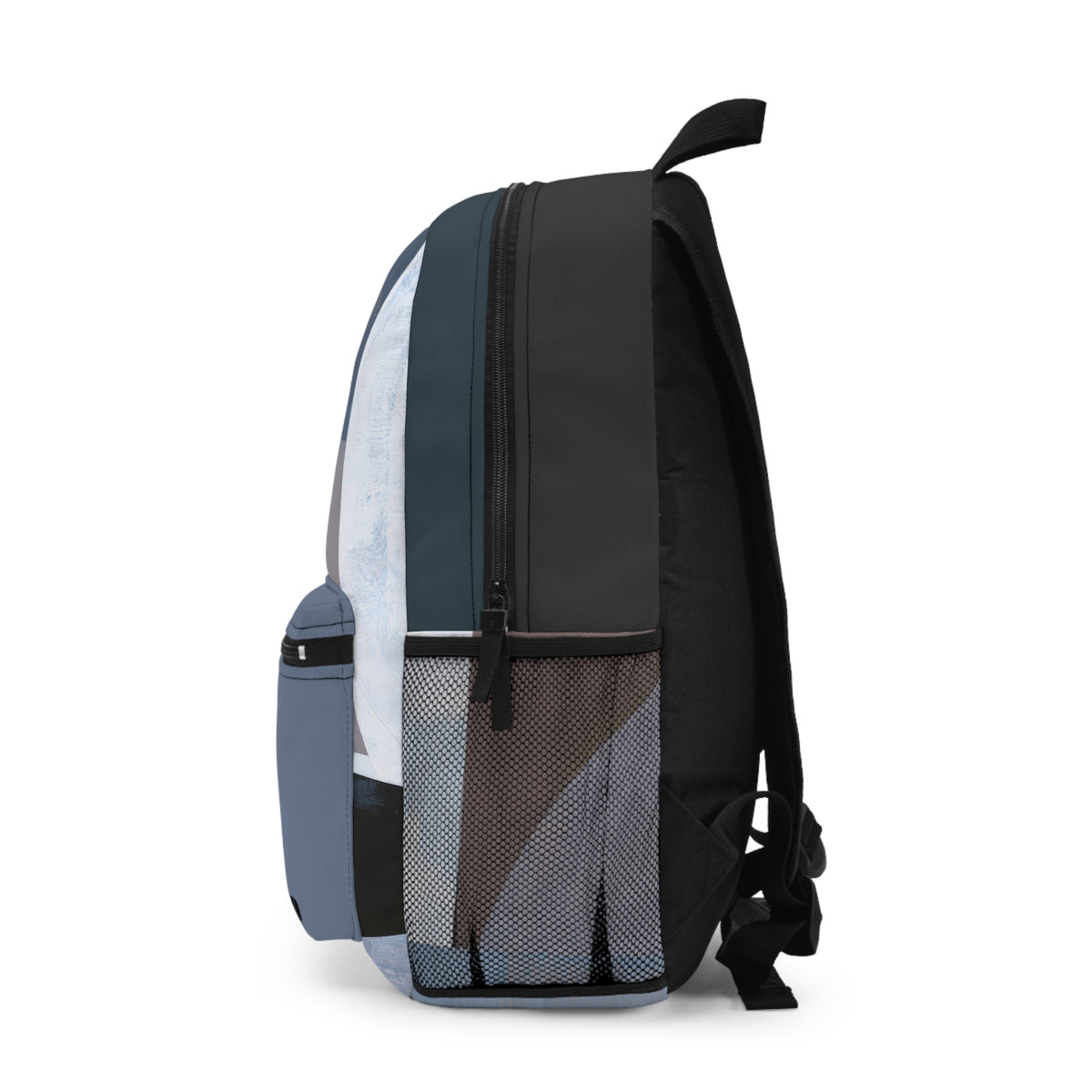 A side profile view of a backpack on a white background, featuring a color-blocked design with slate blue, navy, black, and light gray panels, along with a mesh pocket.