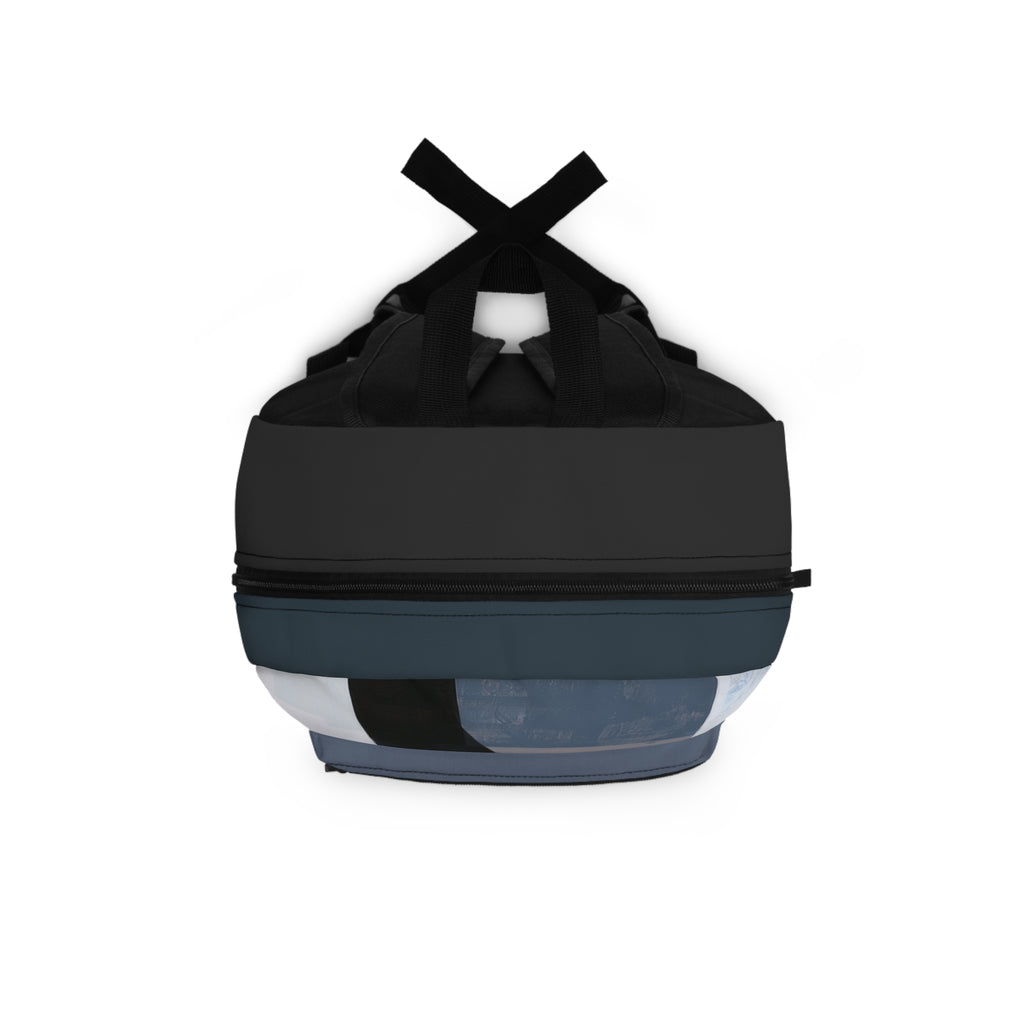 Top view of a structured backpack with black, dark blue, and light gray, shown on a plain white background.