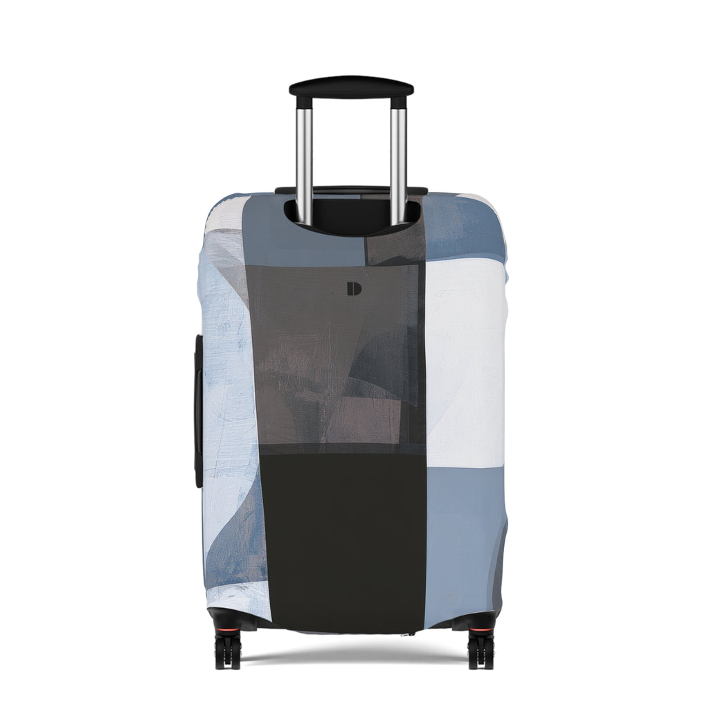 A hard-shell rolling suitcase with an abstract patchwork luggage cover in shades of blue, gray, black, and white, featuring an extended telescoping handle and four spinner wheels, shown against a plain white background.