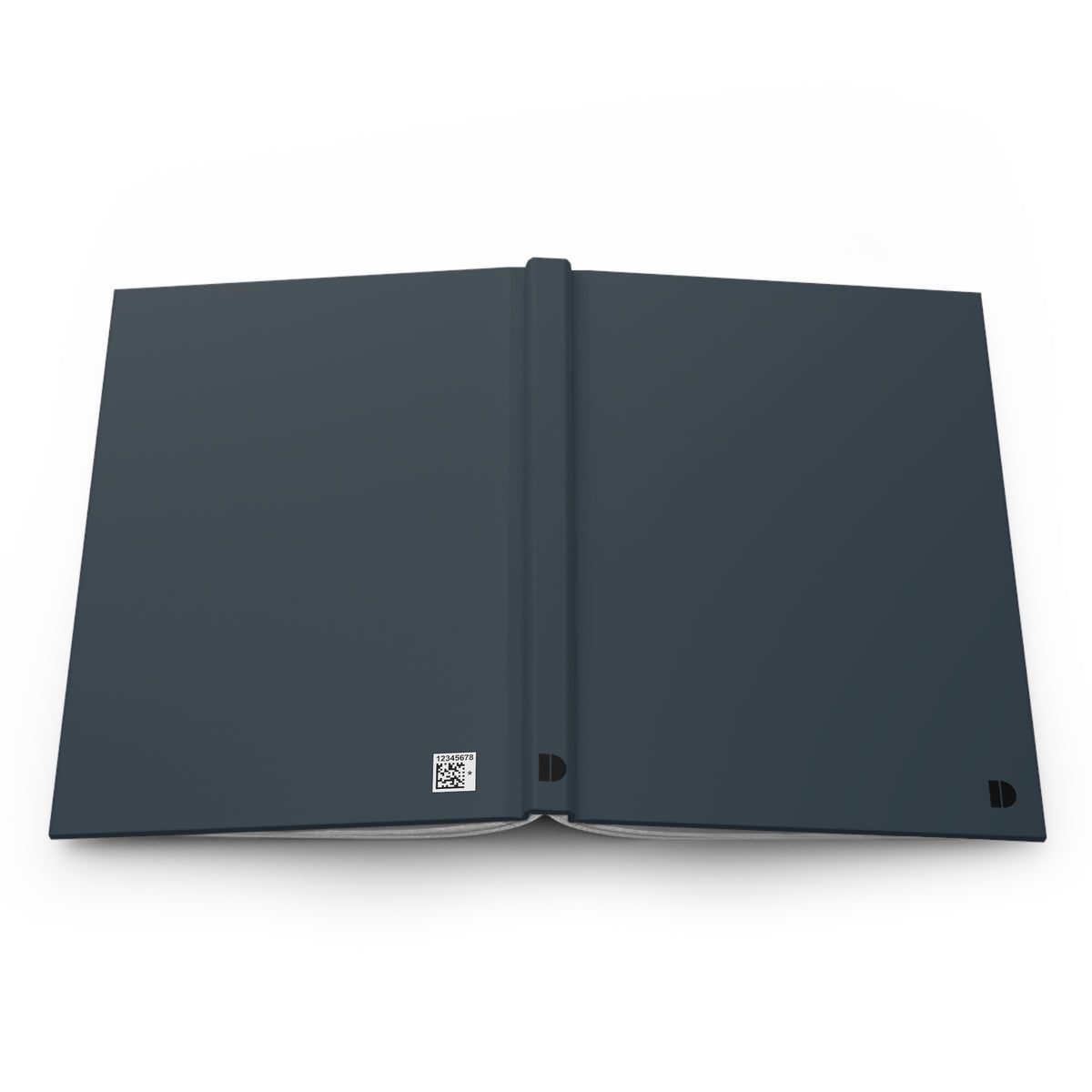A dark slate blue hardcover journal shown open flat against a clean white background, featuring a small square QR code on the lower left cover and a stylized 'D' mark on the lower right.