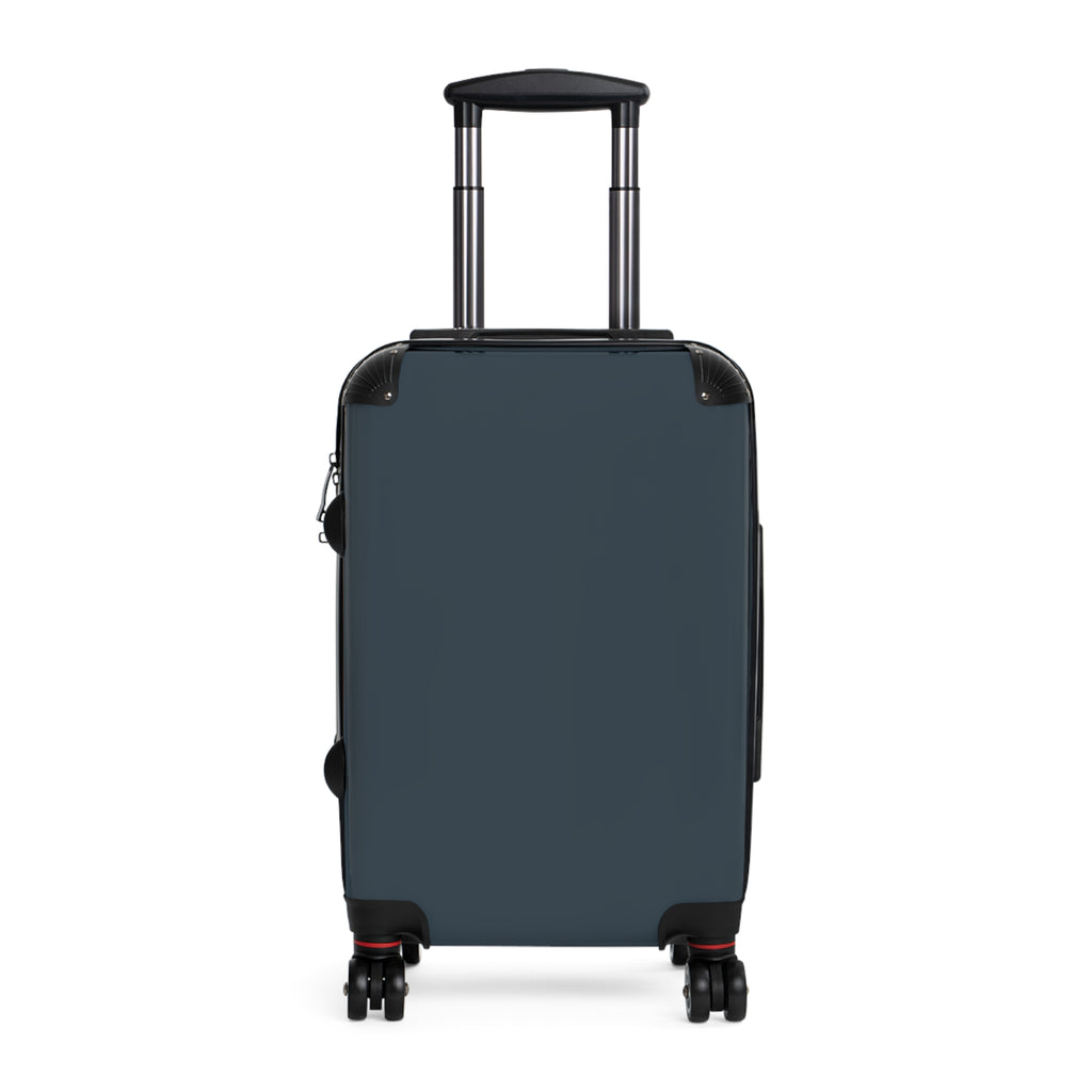 A dark slate blue hard-shell suitcase with an extended telescoping handle and four spinner wheels, shown from a front-facing angle on a solid white background.