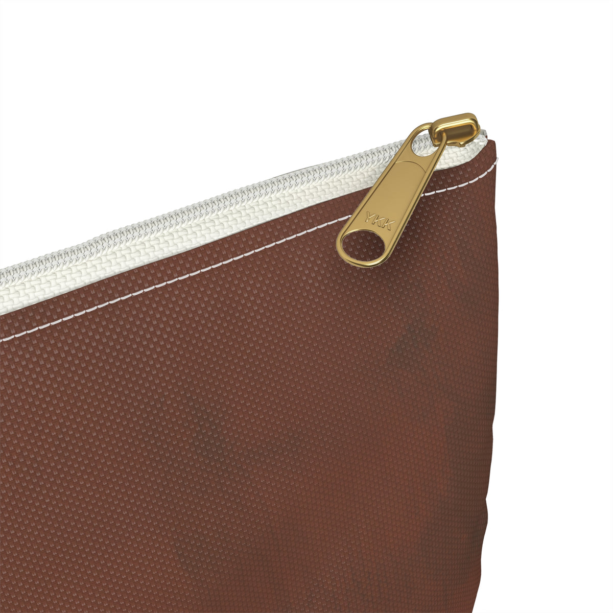 Close-up of a brown textured zippered pouch with a gold-tone metal zipper pull and white zipper tape, shown on a plain white background.
