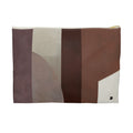 A rectangular zippered pouch with an abstract geometric pattern in shades of brown, beige, and mauve, featuring a small black monogram logo on the bottom right and a gold zipper pull.