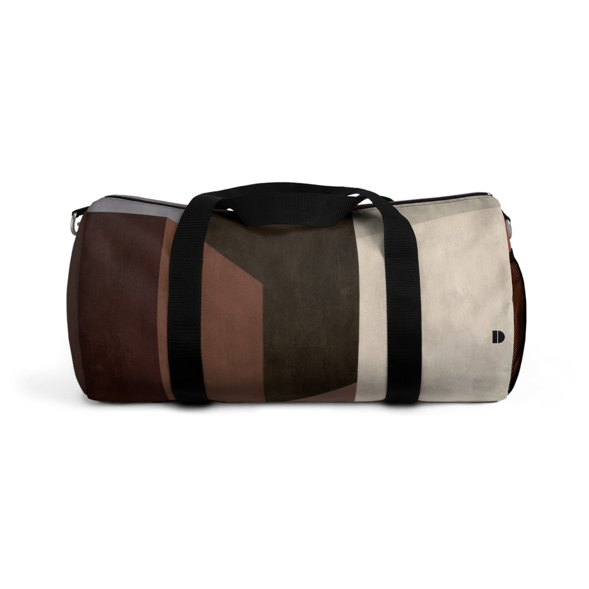 A cylindrical duffle bag with a geometric color-blocked pattern in shades of brown, beige, and gray, featuring black webbing handles and a shoulder strap with silver metal hardware, shown against a plain white background.