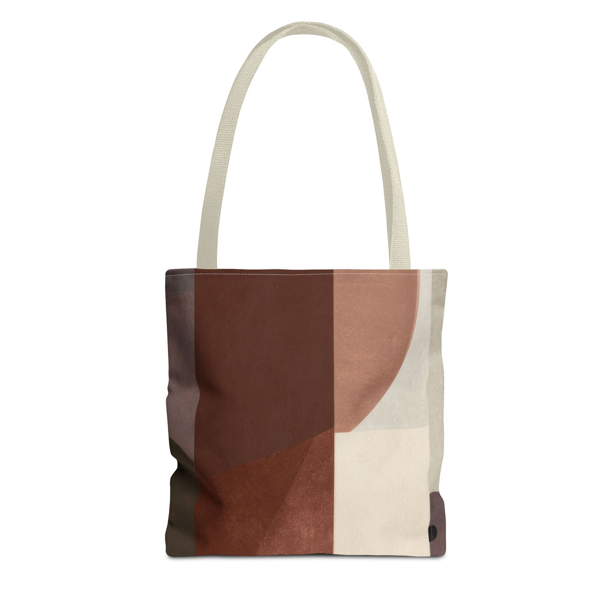A canvas tote bag with a modern abstract geometric pattern in shades of brown, beige, and cream, featuring dual cream-colored shoulder straps, shown against a plain white background.